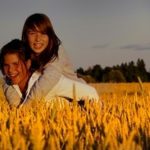 Two girls in a wheat field