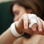 Girl with a bandaged finger