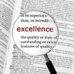 A word "excellence" under a magnifying glass